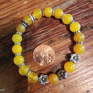 Yellow jasper stretchy bracelet.  Bought as genuine from evolve Mala.